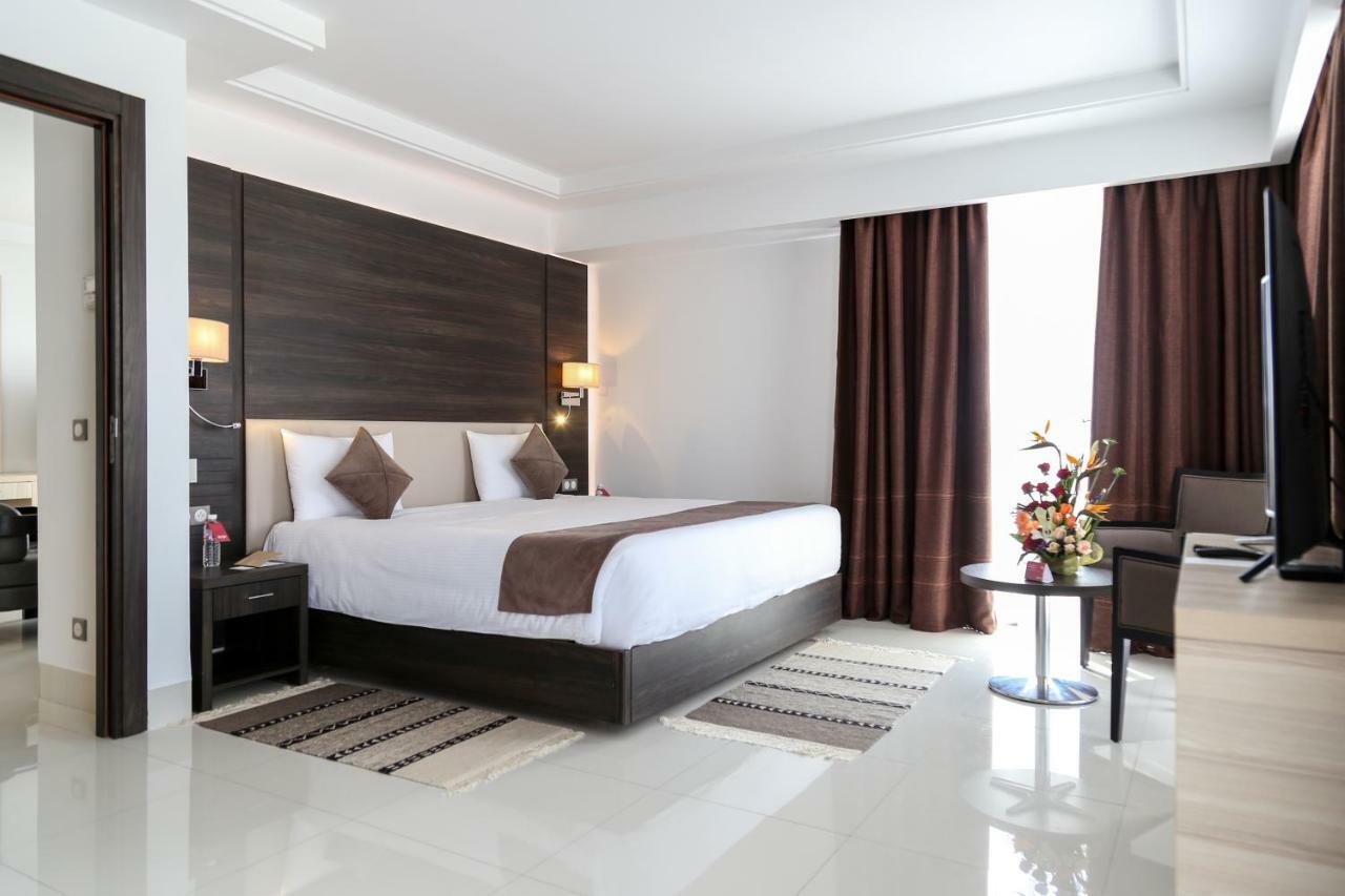 Radisson Hotel ספקס מראה חיצוני תמונה A bedroom at the hotel