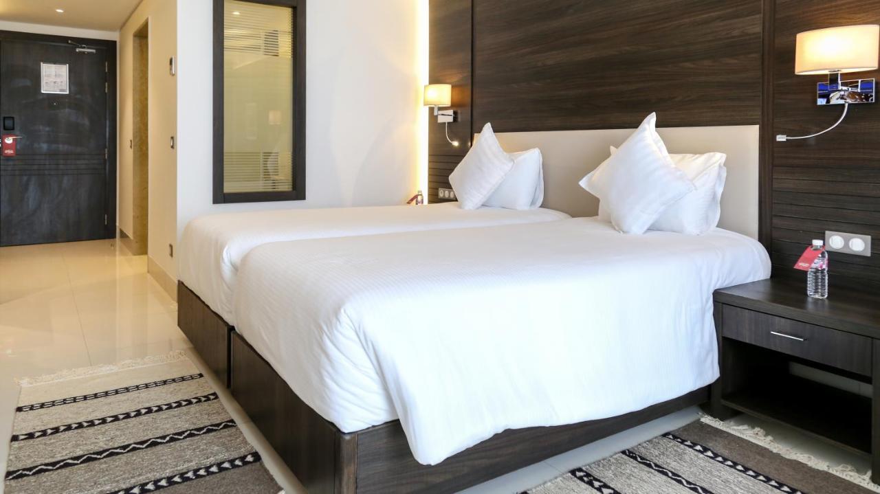 Radisson Hotel ספקס מראה חיצוני תמונה A bedroom at the hotel